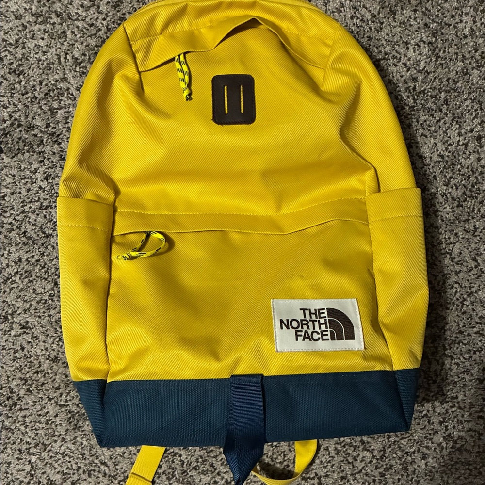 The North Face Vibrant Yellow and Blue Backpack New without tags